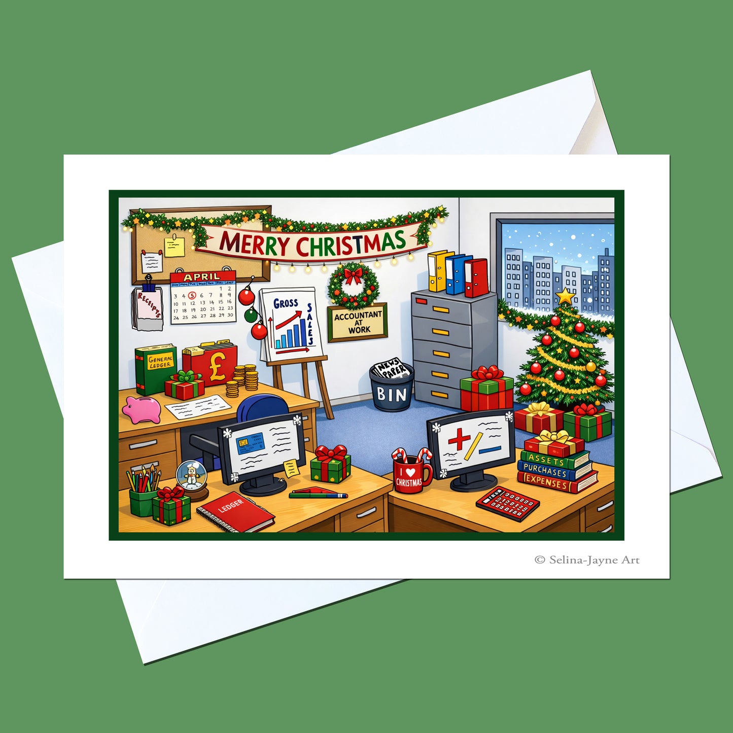A Christmas-themed greeting card featuring a colorful cartoon office scene with a decorated tree, presents, computer screens, and a 'Merry Christmas' banner, shown with white envelopes on a solid green background.