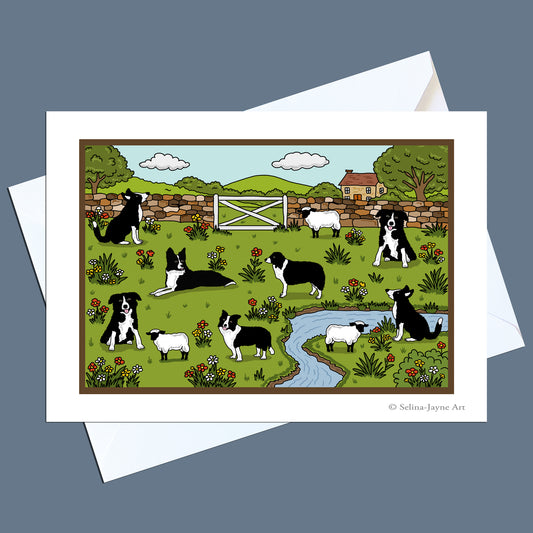 Greeting card with illustration of border collies and sheep in a pastoral scene, featuring a white envelope.