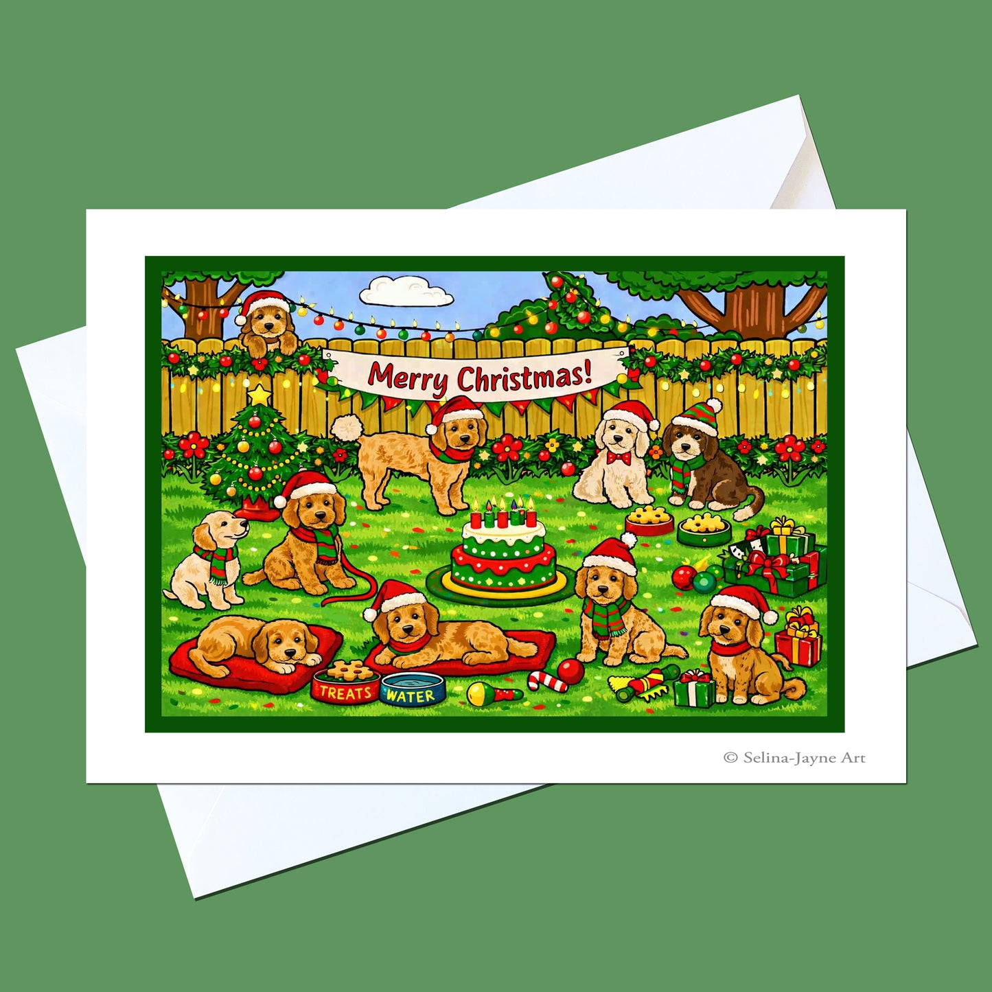 Cockapoo Christmas card by Selina-Jayne Art featuring a wintery illustrated Cockapoo scene, shown with a white envelope on a green background