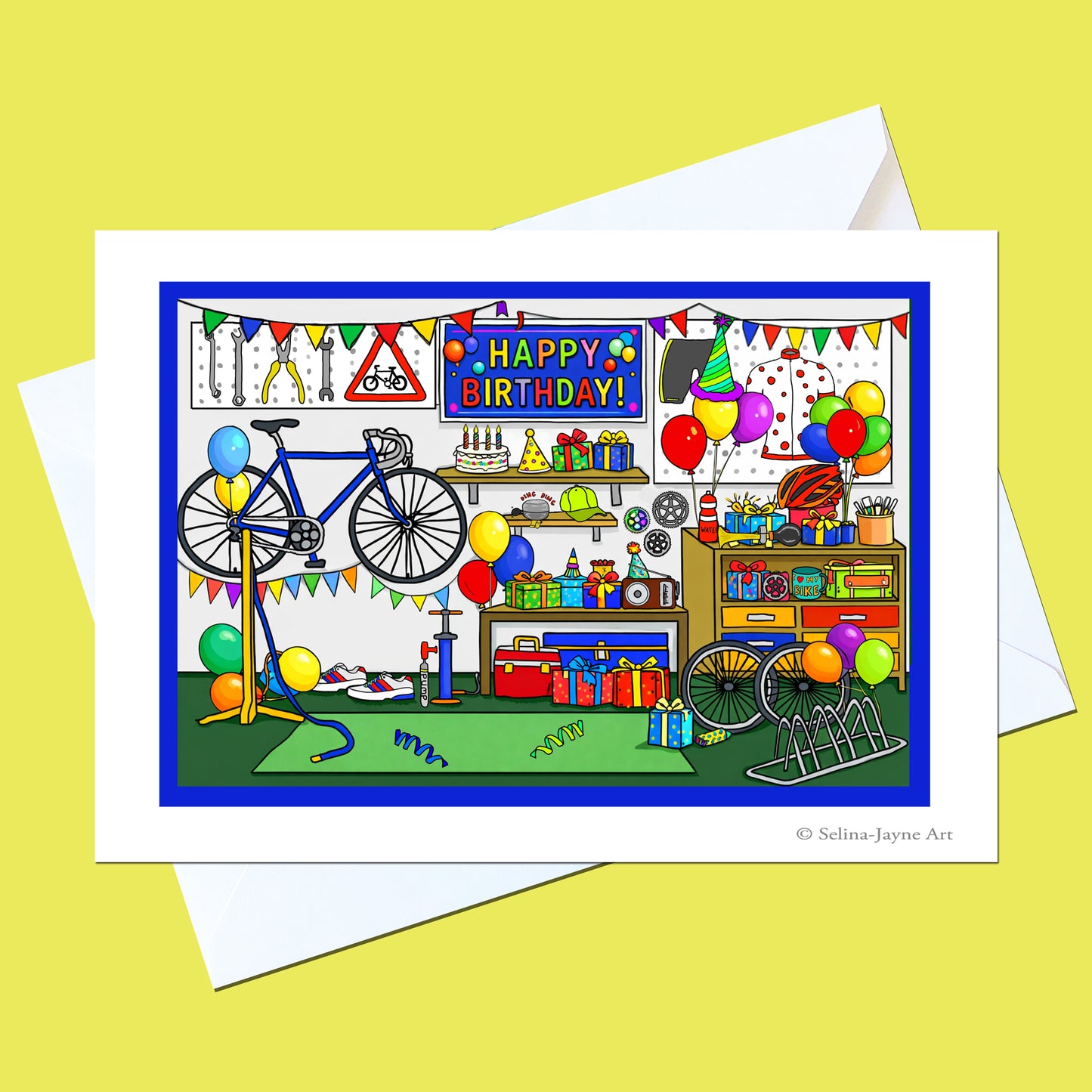 A birthday art print card featuring a colorful, hand-drawn illustration of a bicycle shop with balloons, shelves, and a 'Happy Birthday!' sign, shown with a white envelope on a yellow background.