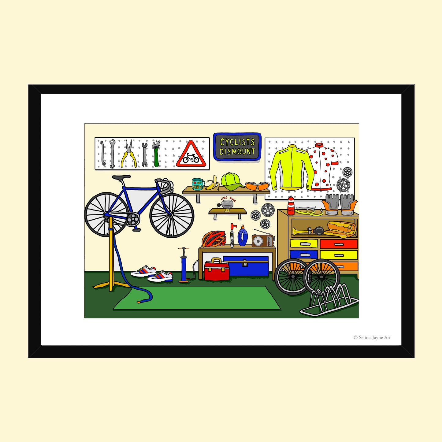 A framed art print depicting a colorful bicycle workshop scene with a blue bicycle on a stand, tools on a pegboard, shelves, and storage drawers, shown against a light cream background.