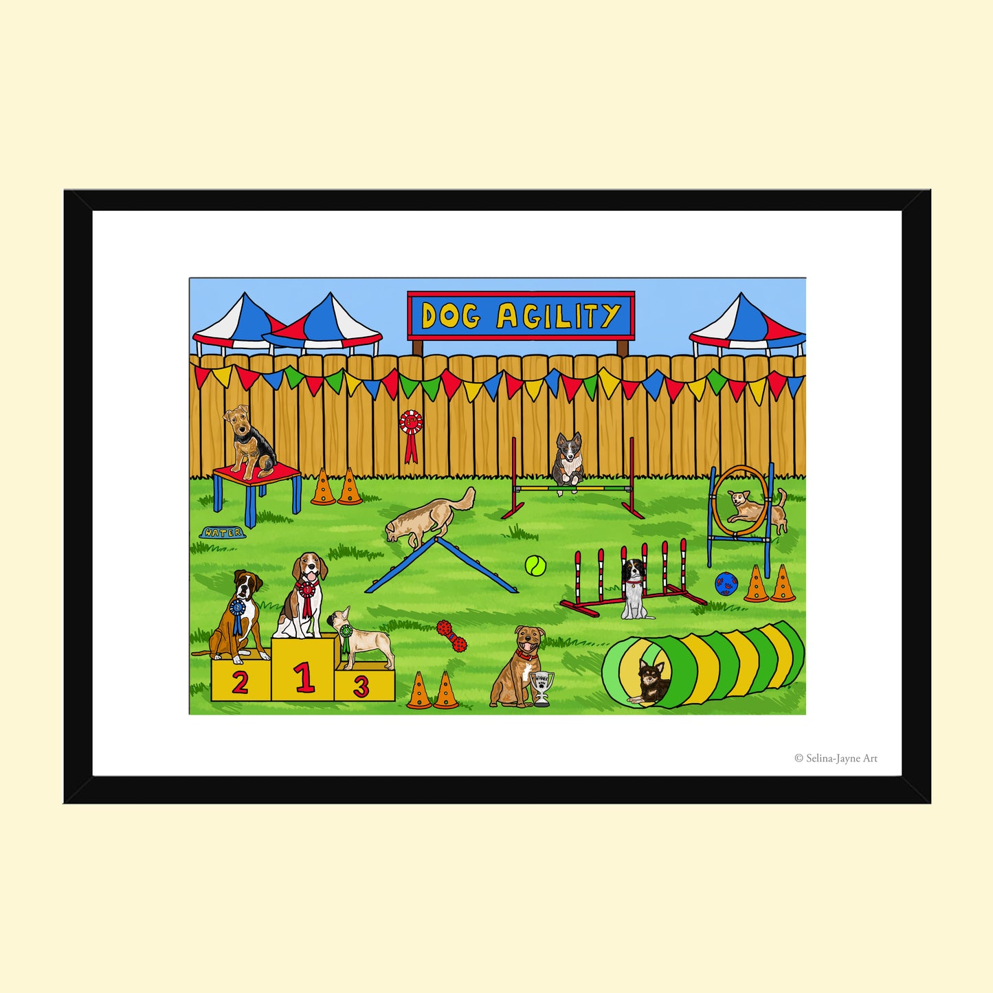 A framed art print featuring a colorful cartoon dog agility race scene, displayed on a light beige background. The print has a white mat and is enclosed in a black frame.