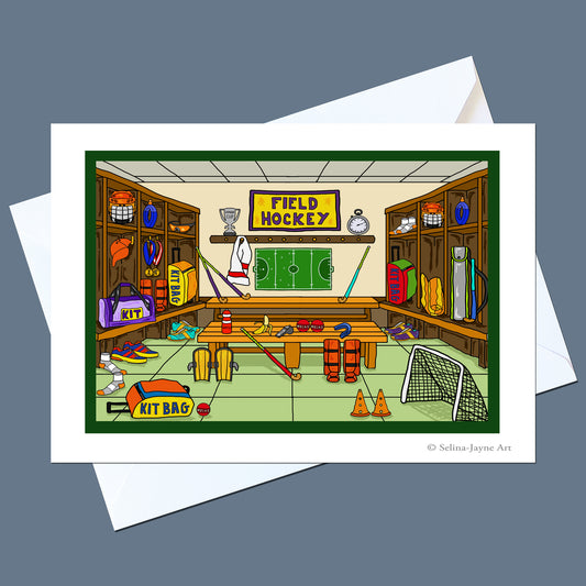 A square art print or card showing a colorful illustrated locker room labeled 'FIELD HOCKEY,' with hockey equipment, shelves, goals, and a green floor, displayed on top of white envelopes against a slate blue background.