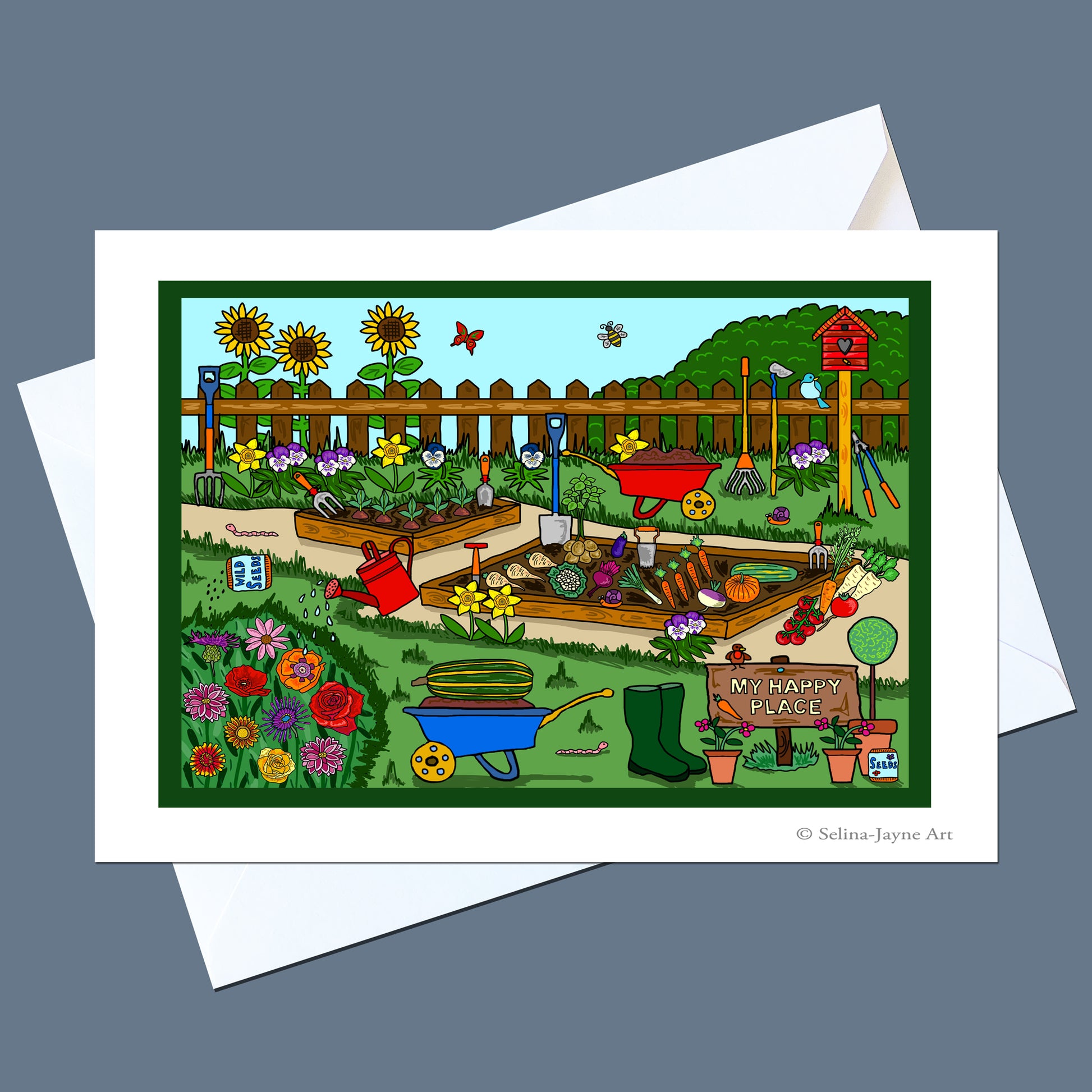 A square art print or greeting card featuring a colorful illustrated garden scene with flowers, raised beds, gardening tools, a wheelbarrow, and a sign reading 'My Happy Garden,' shown with white envelopes on a gray background.