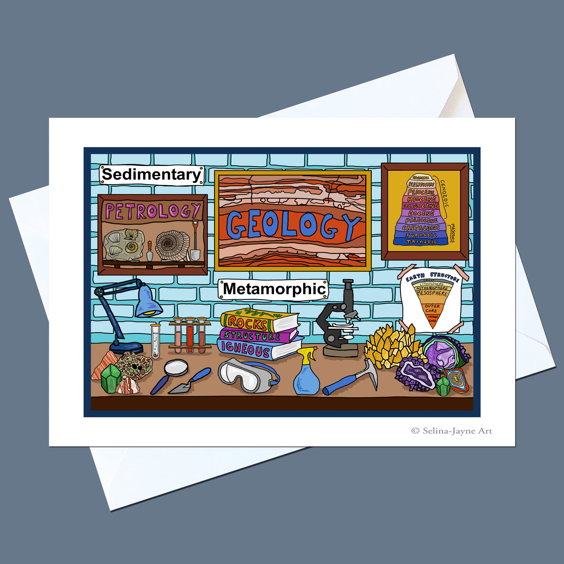 A square art print or card featuring a colorful cartoon illustration of a geology lab, with framed signs reading Sedimentary, Petrology, Geology, and Metamorphic, plus drawings of tools and rocks, shown on top of white envelopes against a muted blue-gray background.