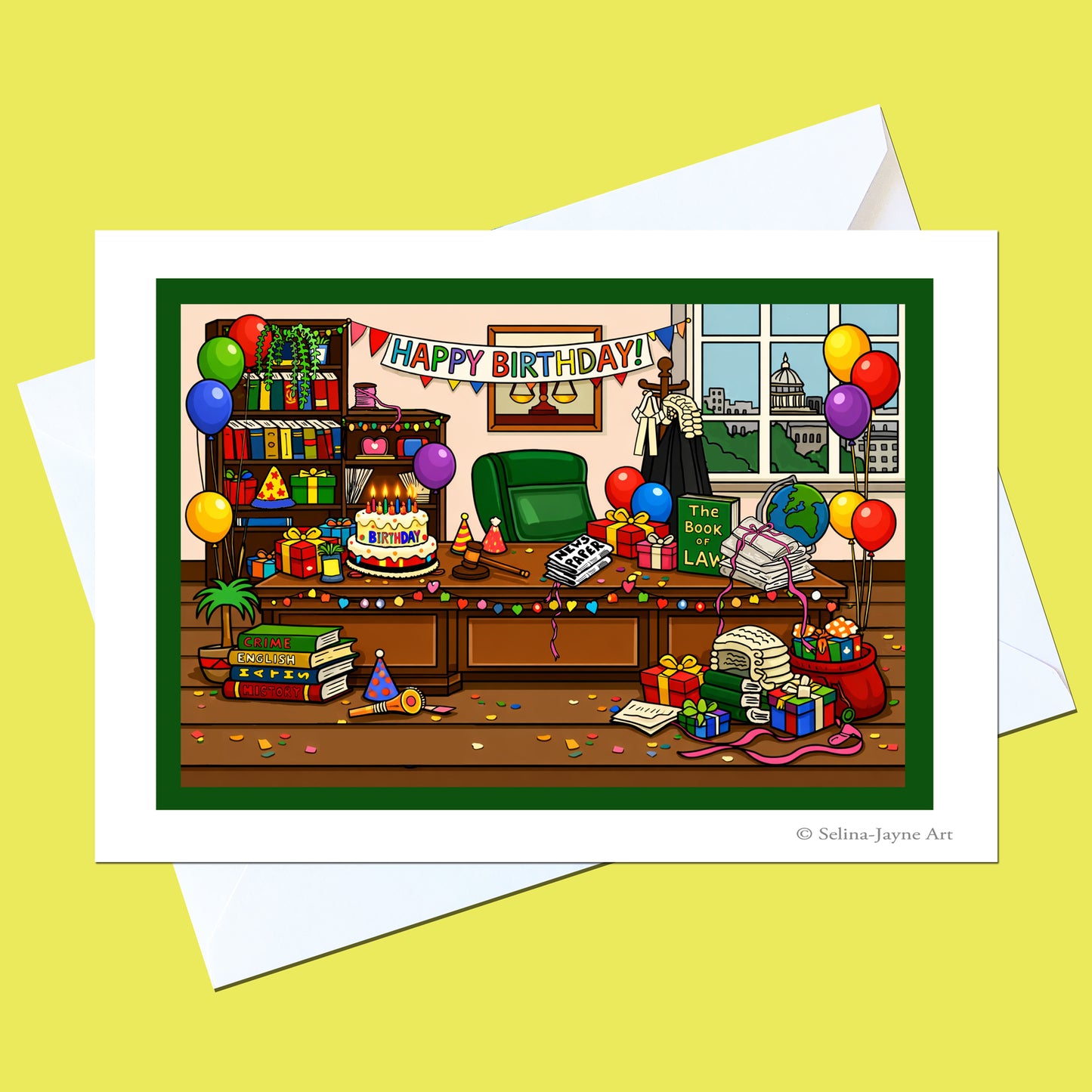 A birthday greeting card featuring a colorful cartoon illustration of a busy office with balloons, gifts, books, and a character in a suit, shown with white envelopes on a pale yellow background.