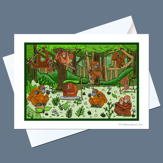 A white art print card featuring a colorful cartoon illustration of orangutans in a forest, shown with a white envelope on a slate blue-gray background.