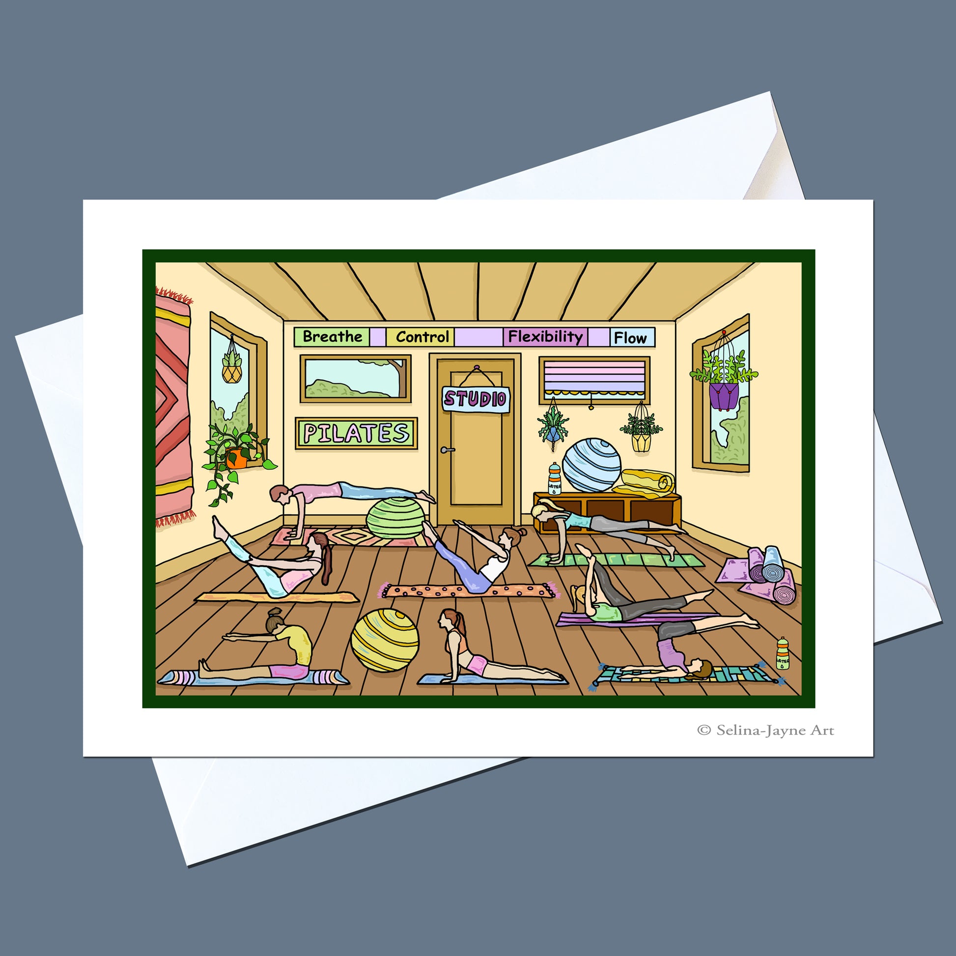 A square art print or card featuring a colorful cartoon illustration of people practicing yoga in a studio, displayed on top of white envelopes against a slate blue background. The print includes the text 'Yoga' and 'Sattva' and is signed 'Selina Jayne Art' in the lower right.