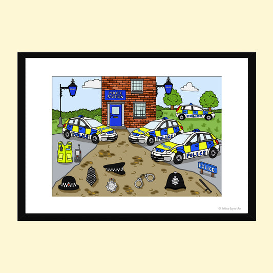 A framed cartoon art print depicting a police station scene with three marked police cars, a brick station building, and various police accessories on the ground, shown against a pale yellow background.