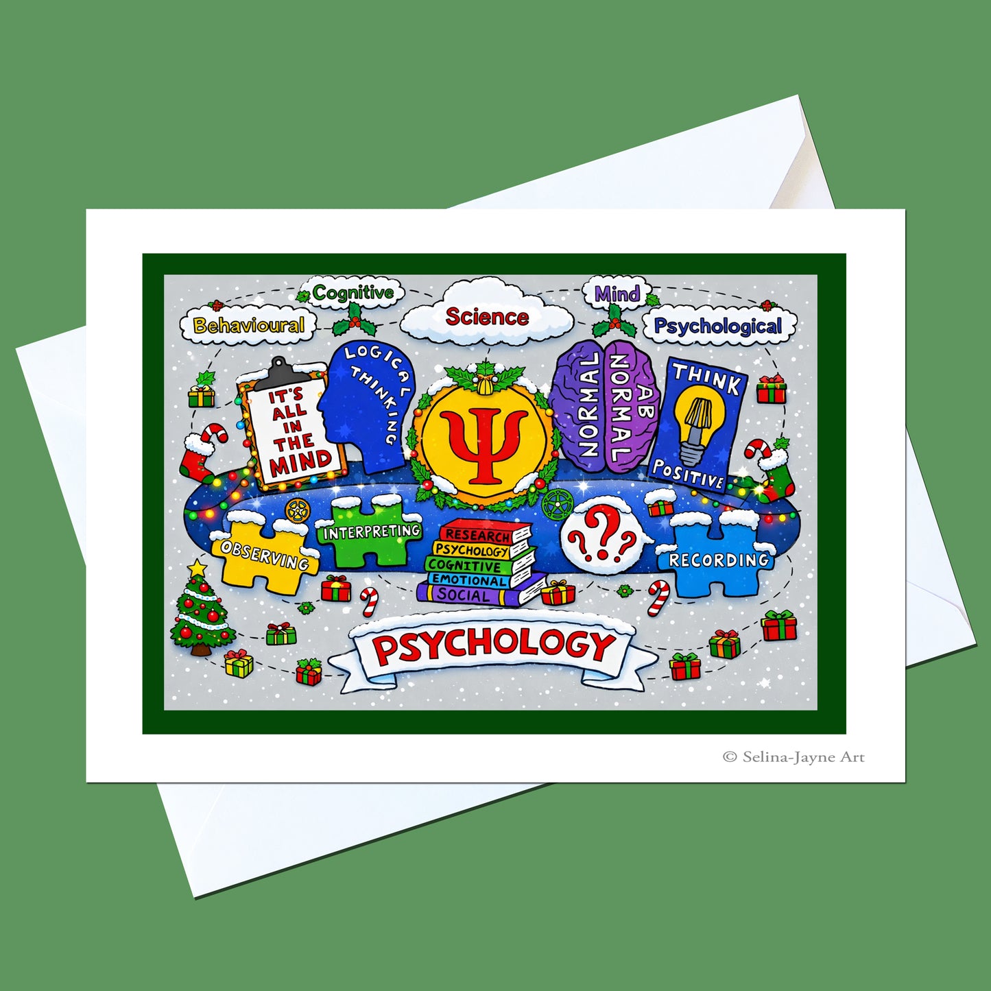 A square greeting card with a white envelope, featuring a colorful cartoon illustration themed around psychology and Christmas. The card has a dark green border, a light gray background with snowflakes, and a white banner reading 'PSYCHOLOGY'.