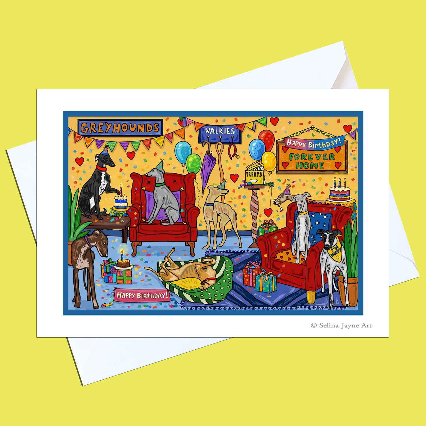 A square greeting card with a white border and white envelope, featuring a colorful cartoon birthday party scene with greyhounds and other dogs. The card is photographed on a pale yellow background.