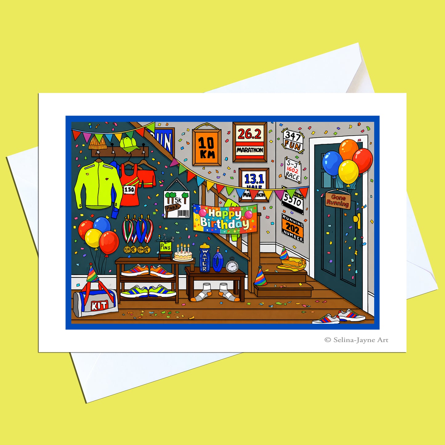 A greeting card featuring a colorful cartoon illustration of a runner's training room with a 'Happy Birthday' sign, shown with white envelopes on a pale yellow background.