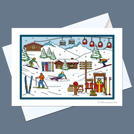 A square art print featuring a colorful winter ski resort scene with skiers, snowboarders, cabins, mountains, gondolas, and signs, displayed on top of white envelopes against a slate blue background.