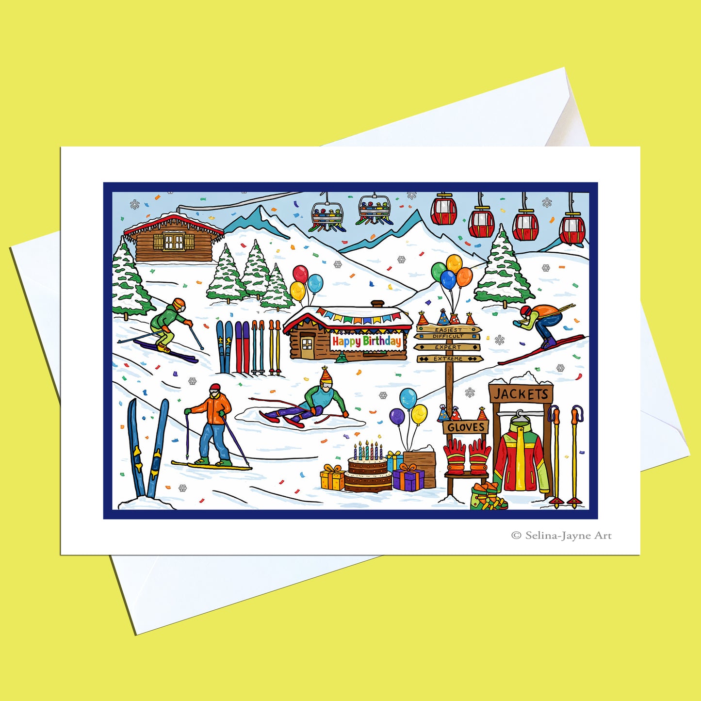A square art print with a white border showing a colorful illustrated winter ski resort scene, displayed on top of white envelopes against a pale yellow background. The print includes skiers, lifts, mountains, cabins, balloons, gifts, and signs, with the text '© Selina Jaynes Art' in the lower right.