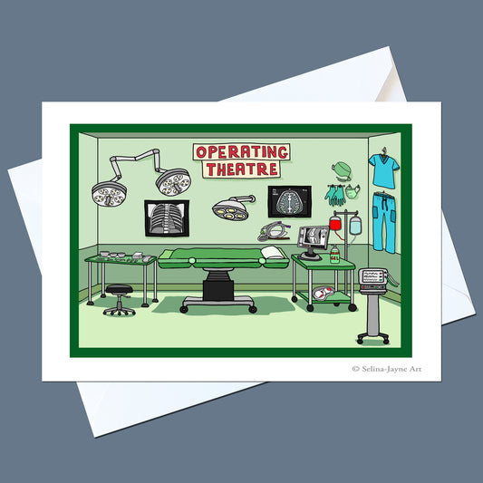A greeting card featuring a cartoon-style illustration of an operating theatre, shown with white envelopes on a slate blue-gray background. The card has a white border and a green frame around the illustration, which depicts medical equipment, an operating table, and medical attire.