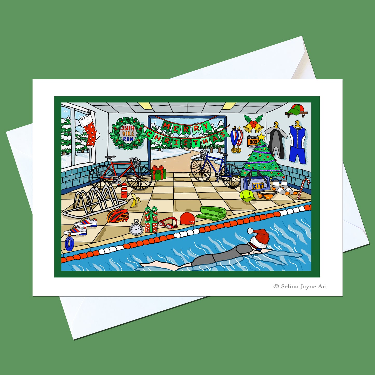 A square art print card featuring a whimsical cartoon illustration of a holiday-themed indoor poolroom, shown with white envelopes on a solid green background. The print includes a swimming pool, bicycles, Christmas decorations, and a person in a Santa hat swimming in the pool.