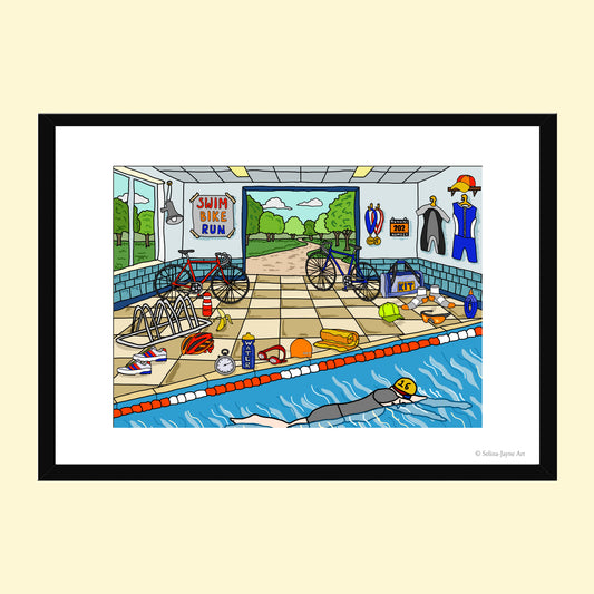 A framed cartoon illustration of a swim room scene with bicycles, swimwear, medals, and a swimmer in a pool, shown against a pale beige background.