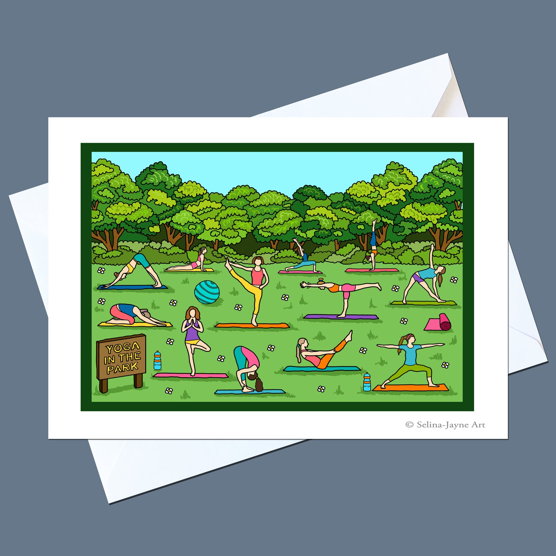 A square art print or greeting card featuring a colorful cartoon illustration of people practicing yoga in a park, shown with white envelopes on a dark gray background. The print includes the text 'YOGA VASALA PRANJA' and a small credit '© Selina Jaypee Art'.