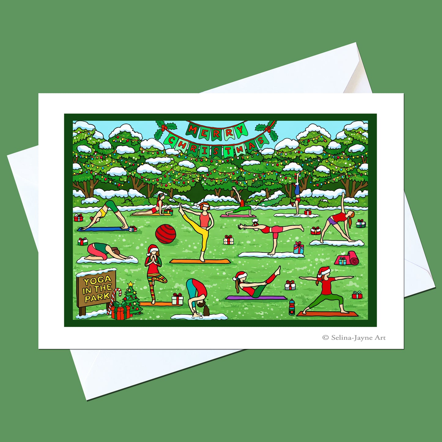 A square art print or greeting card featuring a colorful cartoon illustration of people practicing yoga in a snowy park, shown with white envelopes on a solid green background. The print includes a 'MERRY CHRISTMAS' banner and the text 'YOGA YOUTH PARK' in the lower left.